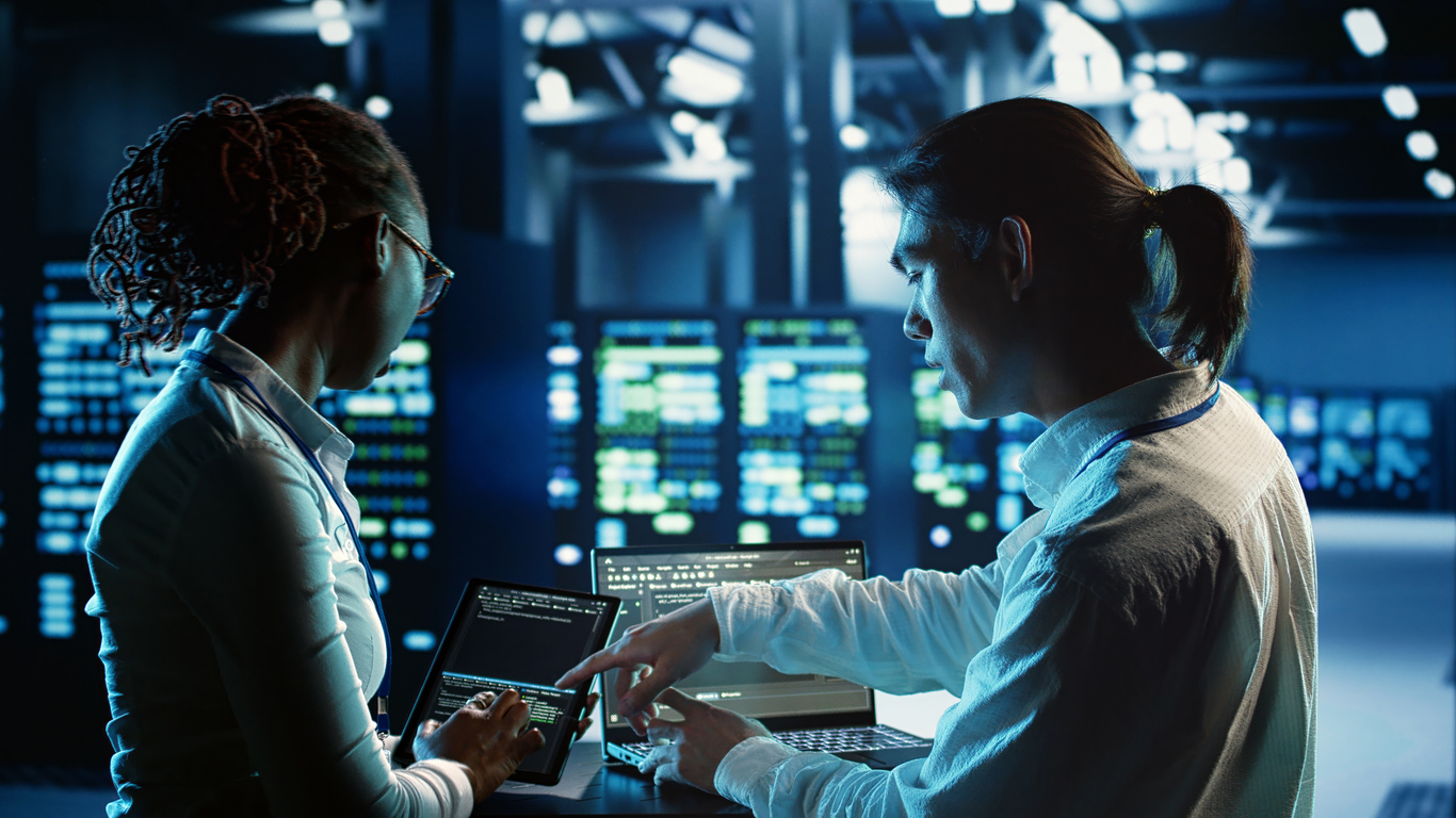 Cybersecurity and network professionals at work.