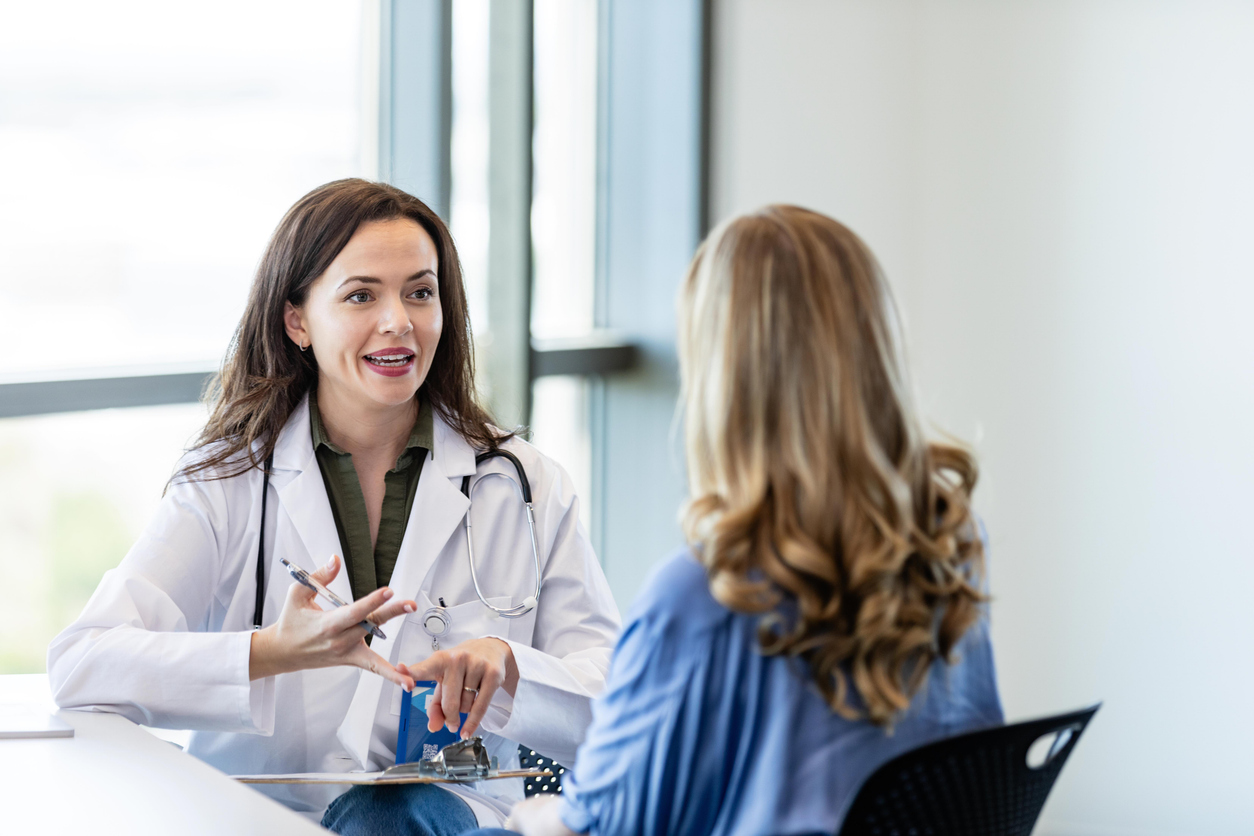 A Nurse Practitioner Talks to a Patient