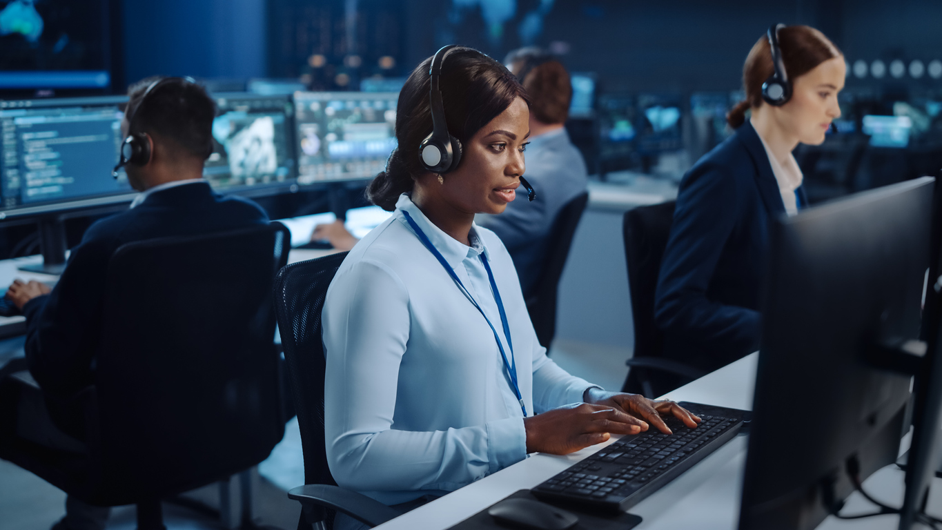 A Team of Cybersecurity Experts Working on Computers.
