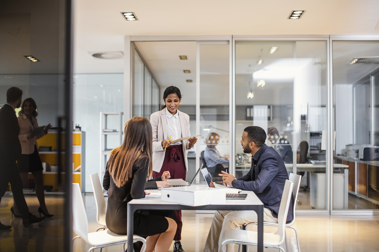 IoT security professionals having a meeting in a conference room. 